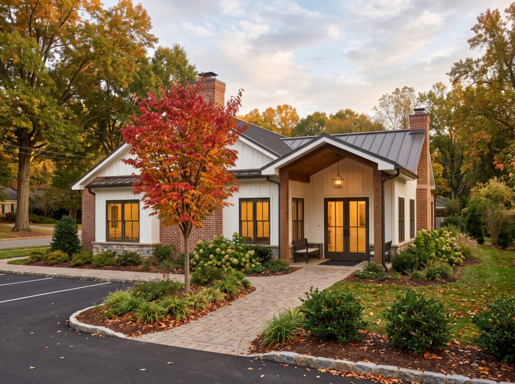 Dental office exterior with a sourwood tree in red fall color